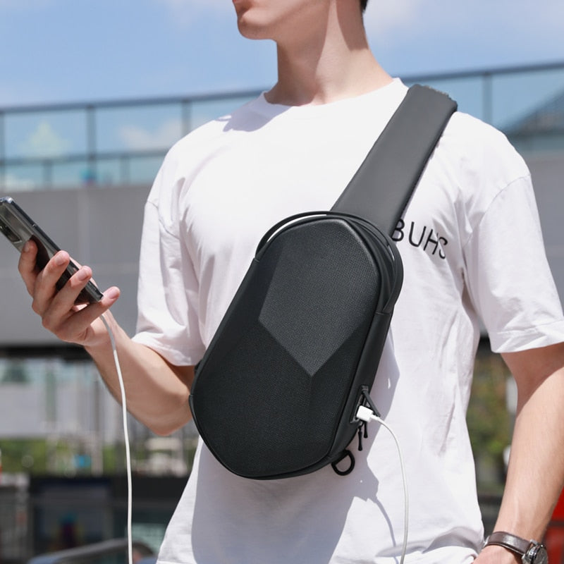 Worried About Broken Gear, Dead Phones, or Rain Ruining Your Travel Stuff? This Men's Hard-Shell Bag Fixes It All