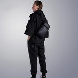 Kingsons 2026 Men's Waterproof Chest Bag 9.7 Inch Tablet Sling Crossbody Business Bag with Concise Design Black